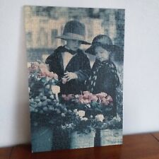 Tableau puzzle photo LES ENFANTS ET LA ROSE collé sur bois avec attache 