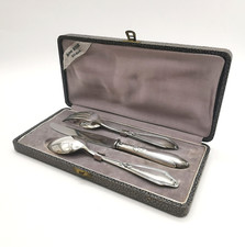 Coffret 4 couverts argenterie