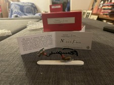 Figurine pixi signature franquin patin à glace