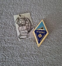 Insigne / pucelle 1 e
