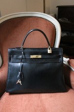 Hermès sac à main modèle Kelly 35 en cuir box noir