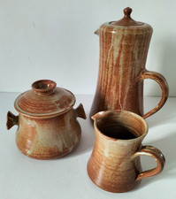 Service café en grès signé