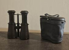 ancienne  paire de jumelles avec étui en cuir