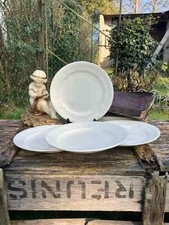 4 Assiettes à relief -