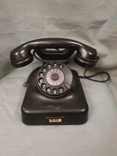 Téléphone disque en - À,