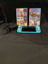 Nintendo Switch Lite Console Portable - Turquoise Avec 2 Jeux . 