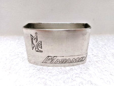 Rond de serviette en métal argenté " Madame " (Maillechort)