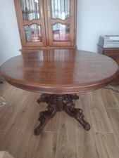Table ronde ancienne en noyer