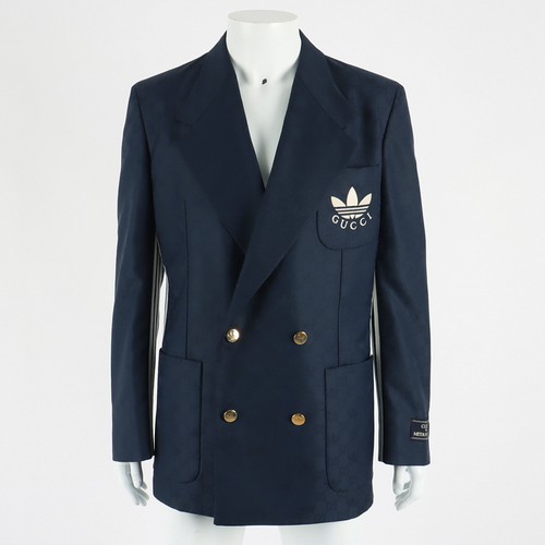 Gucci veste adidas 125101 - adidas,