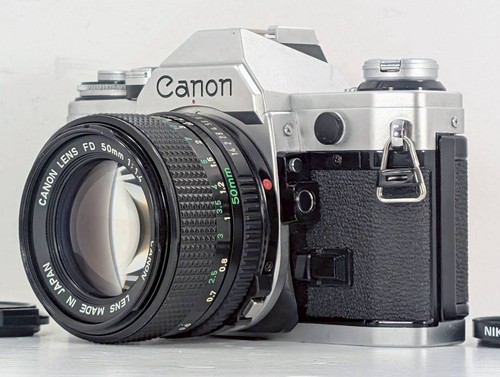 Exc canon ae - [exc+5],