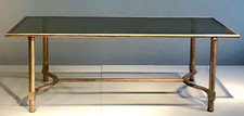 RAMSAY  Table Basse en métal doré, piétement entretoise et plateau verre noir.