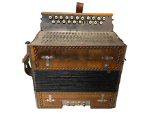 Accordéon ancien bouton E. &