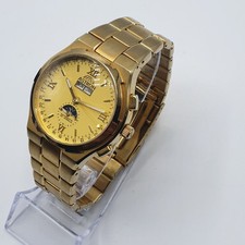 Montre Astron Automatic 35 Jewels – Moonphase – suisse- Jour/Date -D'oré– Homme