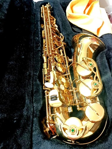 Gold saxophone with cleaning - gold,