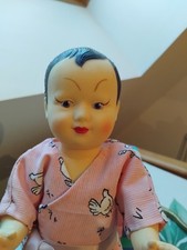 baigneur "asiati" yeux peints