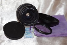 Objectif M42 29mm f2,8 CARL ZEISS, bouchons, filtre 1A, pare-soleil, housse TBE