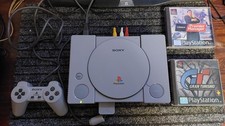 Sony PlayStation 1  SCPH-1002 avec 2 jeux SUPERBE