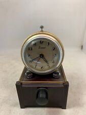 ANCIEN REVEIL DE LA MARQUE SCOUT AVEC PIED EN BAKELITE