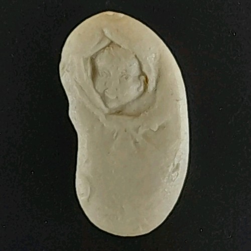 Fève bébé emmailloté - le,