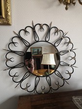 Miroir soleil en fer forgé et décor fleurs de lys et pointes en laiton
