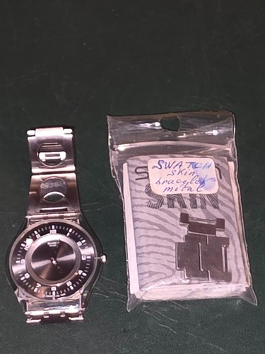 Montre swatch skin - skin, resine