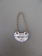 ancienne petite plaque émaillé pour col ou goulot de bouteille de MIRABELLE
