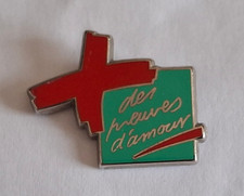 PIN'S ARTHUS BERTRAND -  Don sang. Preuves d'amour vert