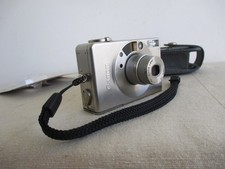 Canon Ixus II APS + sac Façonnable en cuir + pile neuve