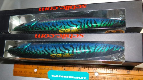 Lot two sebile stick - two,