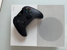 Xbox One S with controller and cables + $150 worth of videos games on it