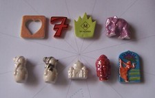 LOT DE 9 FEVES PUBLICITAIRES