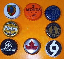 Q13) Un lot de 8 capsules de