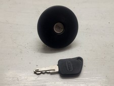 Bouchon réservoir avec une