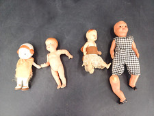 LOT DE 4 PETITS POUPONS