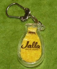 Ancien porte clé Gant de toilette Jalla Griffe Jaune avec inclusion tissu éponge