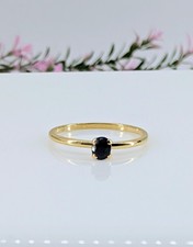 Bague solitaire en or sertie