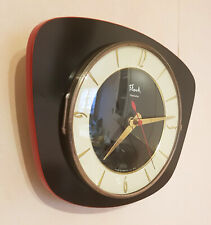 Horloge pendule murale en formica noir et rouge FLASH TRANSISTOR vintage 60 70