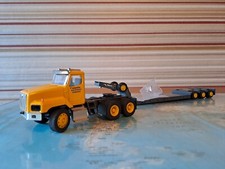 CONRAD 6412/02 International 5600i + remorque TALBERT pour KOMATSU 1:50