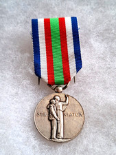 Une médaille Refuge des