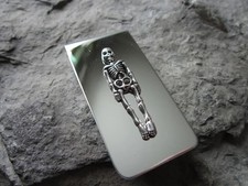 Pince à argent en or blanc 14