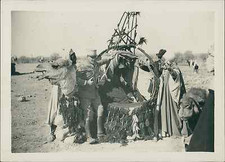 L. Dessault, Alger. Femme dans un "Bassour"  Vintage silver print. Cachet du pho