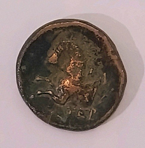Pièce antique grecque - , tête