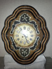 pendule murale oeil de boeuf