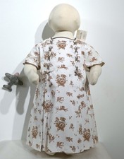 Robe aux nœuds et bouquets de