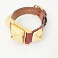 Montre femme HERMES Meador Medor blanche d'occasion en cuir rouge or testée
