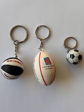 lot x 3 porte clé théme sport : ballon basket  foot locker , rugby, football