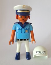 Playmobil policier bronzé avec casquette et casque de moto