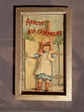 TABLEAU vitré composé d'une CHROMOLITHOGRAPHIE  "ANNETTE A LA CAMPAGNE"