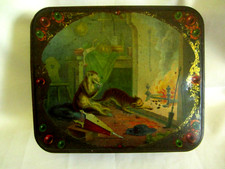 ancienne grande boite a gâteaux singe chat devant cheminée