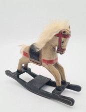 Cheval à bascule miniature en